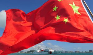Флаг КНР над Южно-Китайским морем. Фото: Hou Jiansen/ Zuma/ Global Look
